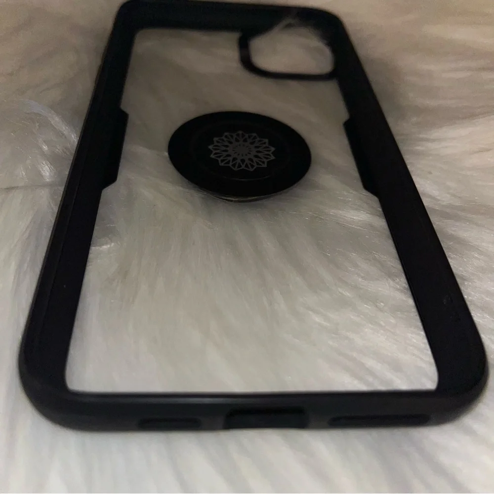 iPhone 11 Pro Max black and clear cell phone cover with stand